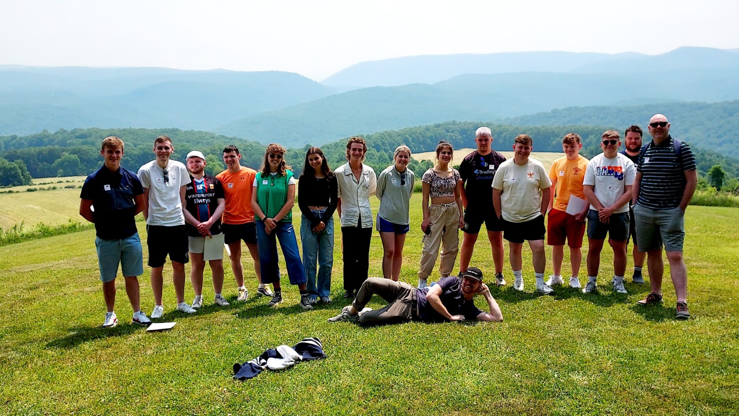 A group of students standing in a field