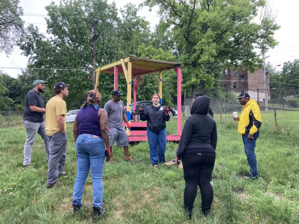 Alexis and community members at park