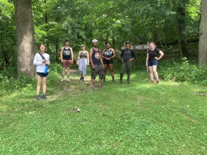 City Semester Pittsburgh participants stand just outside a forested area