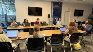 City Semester class; students sitting at tables in classroom