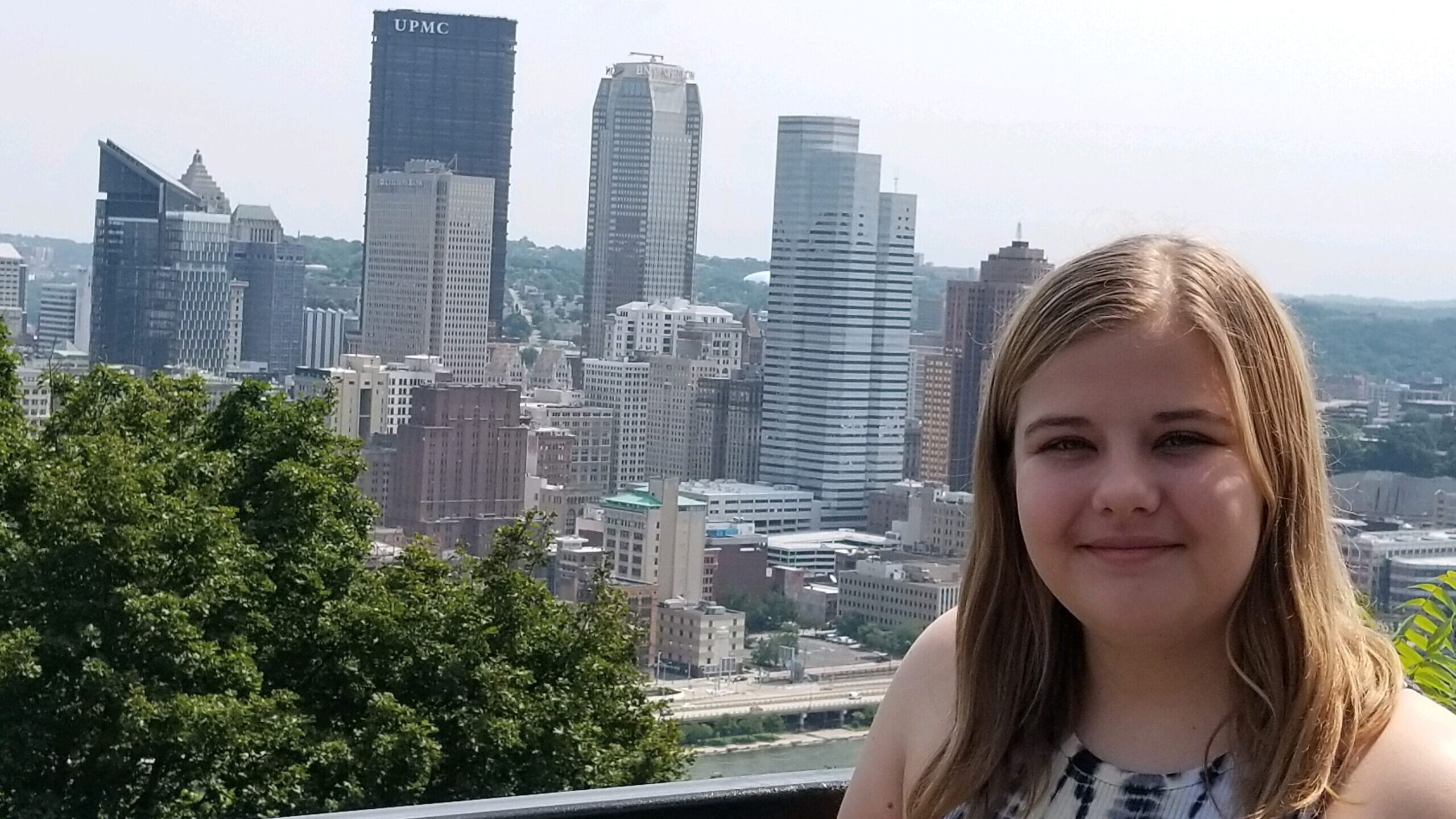 Lauren Russel with the Pittsburgh skyline behind her