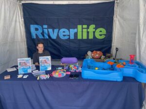 Maddie at Riverlife table