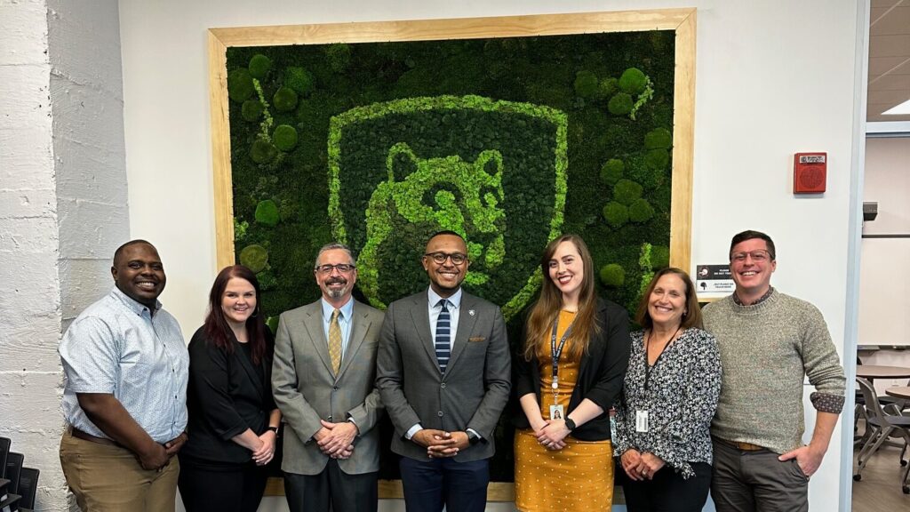 The Penn State Center Pittsburgh and Readiness Institute at Penn State teams pose with Larry Terry.