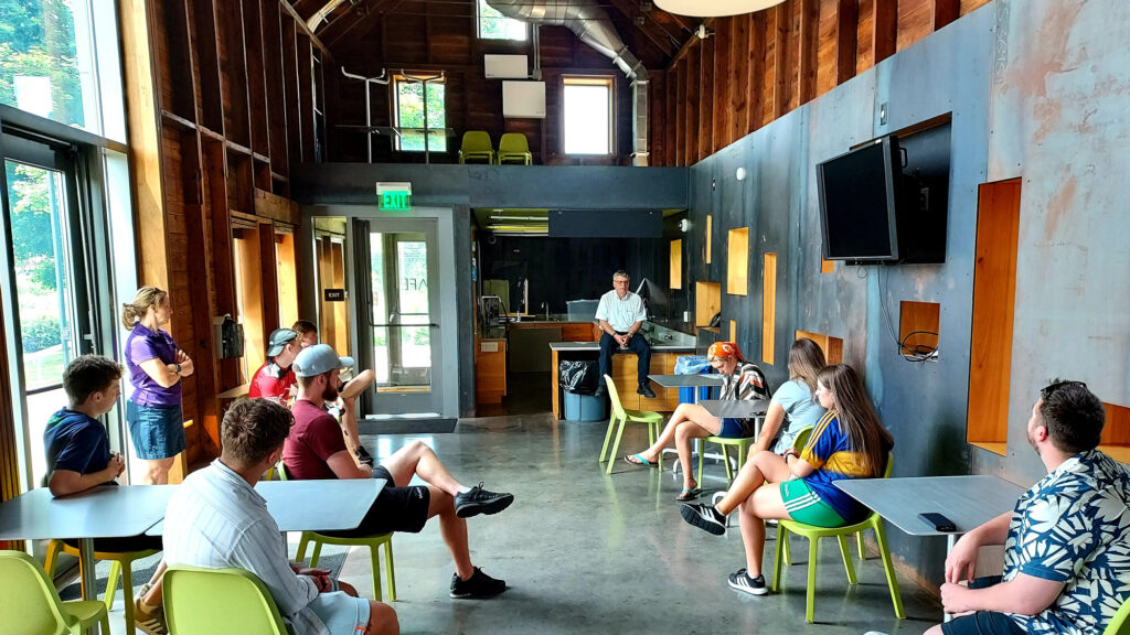 Students sitting inside a high performance building with an instructor