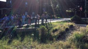 Students looking over open grass lot